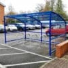 10 Space RAL Blue Oxford Cycle Shelter in outdoor carpark