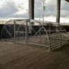 metal 20 space original enclosure with galvanised metal framing and mesh door installed in a commercial carpark