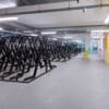 Semi Vertical Cycle Racks installed in an End of Trip Cycle Storage Facility in RAL Jet Black