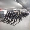 Semi Vertical Cycle Racks installed in an End of Trip Cycle Storage Facility in RAL Jet Black