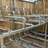 Fixed Two Tier Bike Rack installed in a wooden bike shelter