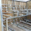 Fixed Two Tier Bike Rack installed in a wooden bike shelter