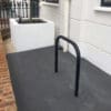 Black galvanised Sheffield Cycle Stand installed outside of a residential property