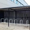 Toastrack Cycle Rack installed within a wooden cycle shelter outside