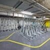 Many Semi Vertical Bike Racks installed in an underground cycle storage facility