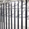 close up of solo vertical bike racks stored in underground cycle storage