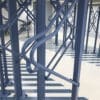 Premium Solo Vertical Bike Rack powder-coated in RAL blue installed in underground storage facility
