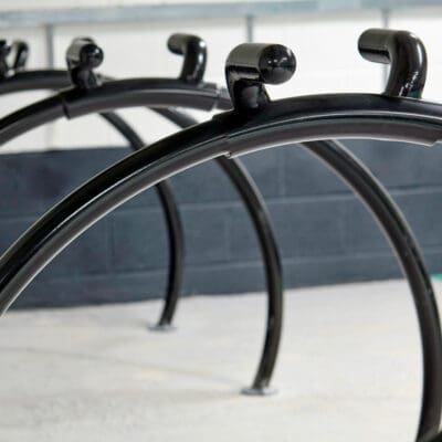 close up shot of a row of jet-black powder coated Equilibrium Cycle Stands