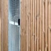Close up of the Amazon Semi Vertical Cycle Shelter with a mesh swing door and access control