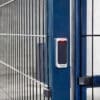 Twin Wire Security Mesh Fencing in RAL blue with a swipe card access lock installed in an underground bike storage facility
