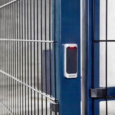 Twin Wire Security Mesh Fencing in RAL blue with a swipe card access lock installed in an underground bike storage facility