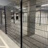 Black Twin Wire Security mesh Partitioning installed in an underground car park