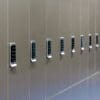 Close up of the Ojmar OCS Pro Lock on a row of Camden Lockers in colour bronze installed in a cycle storage facility