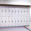 Row of white Camden Lockers installed in an underground cycle storage facility