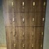 Islington Locker with wood panelling and gold accents installed in an end of trip cycle storage facility