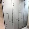 Close up shot of the Newham Locker with grey doors and key lock doors, installed in an underground end of trip facility.