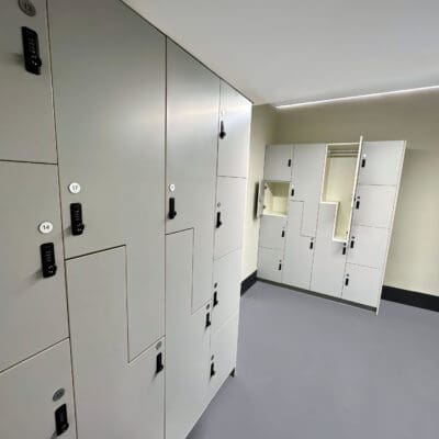 Row of Newham Lockers with grey laminate doors and digi code locks installed in an underground end of trip facility