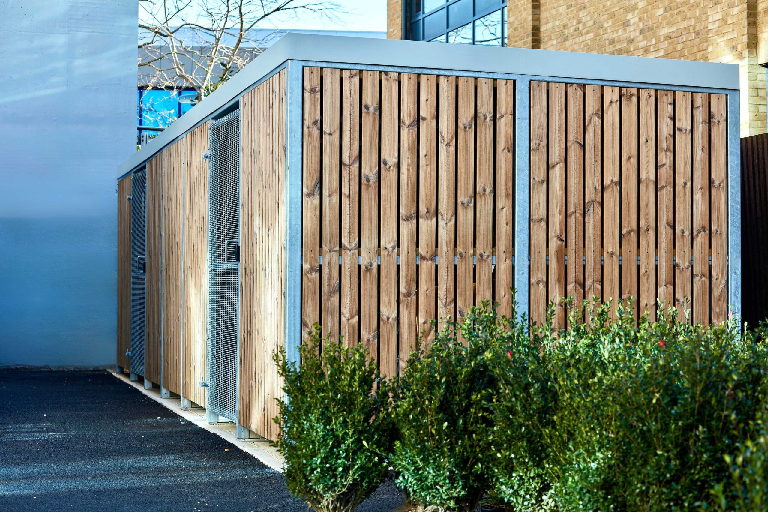 Semi vertical amazon eco cycle shelter installed in a commercial carpark