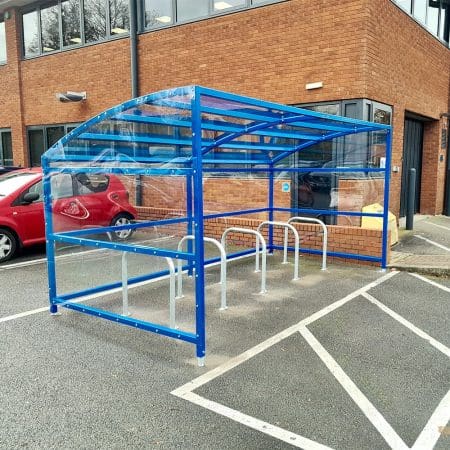 10 Space RAL Blue Oxford Cycle Shelter in outdoor carpark