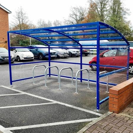 10 Space RAL Blue Oxford Cycle Shelter in outdoor carpark