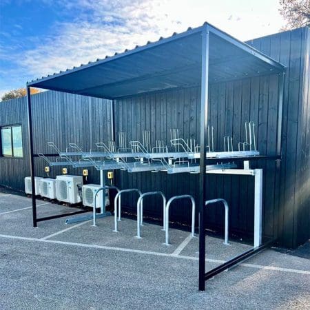 black steel bike shelter with two tier rack installed