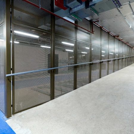 Perforated mesh fencing installed in an underground cycle storage facility