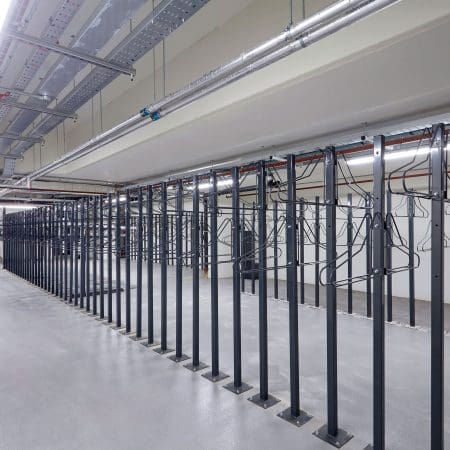 solo vertical bike racks stored in underground cycle storage
