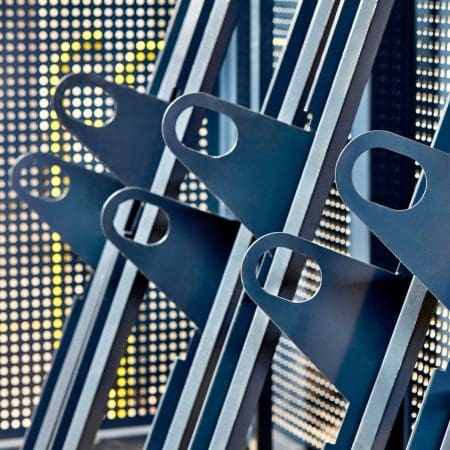 blue semi vertical bike rack locking hoops
