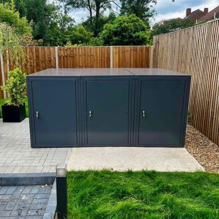 Horizontal 2 Bike Locker installed in a residential backyard next to a grass patch