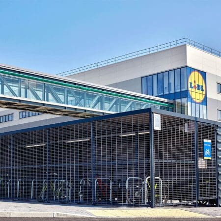 a bicycle rack in front of a building