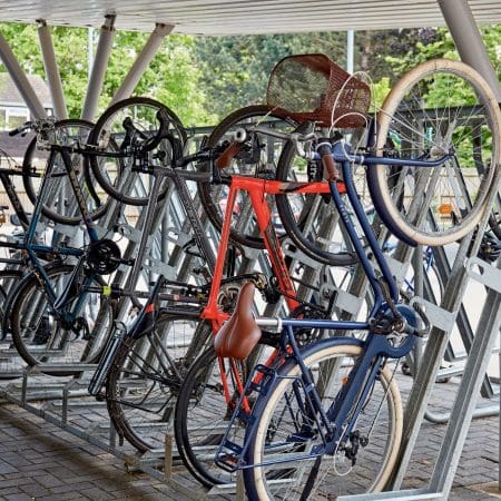 semi vertical bike rack with bikes securely stored outdoors