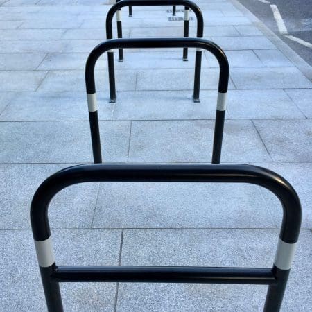 Sheffield Cycle Stand in Galvanised Black installed outside on the footpath