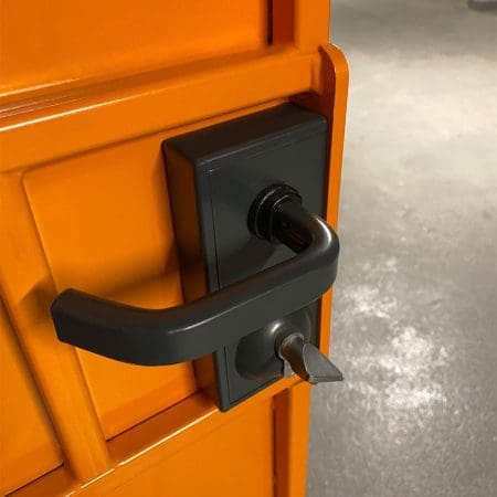 close up of locking system on a orange coloured cycle storage unit