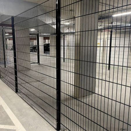 Black Twin Wire Security mesh Partitioning installed in an underground car park