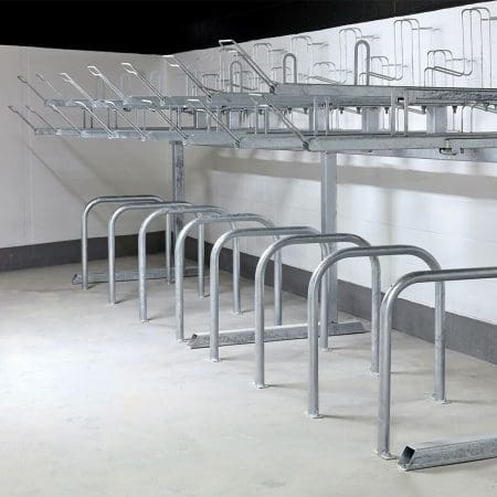 row of Two Tier Cycle Racks inside of a commercial building