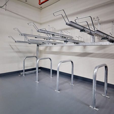 Two Tier Cycle Racks with Sheffield Cycle Stand lowers installed in an underground carpark bike storage facility